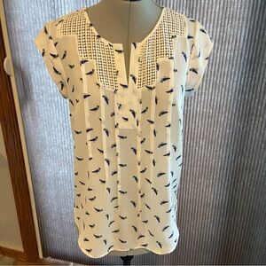 Daniel Rainn henley style shirt with multi color bird print
Style #D15490PR1